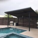 Wrapped up a cool patio cover with a rain sheer over the pool