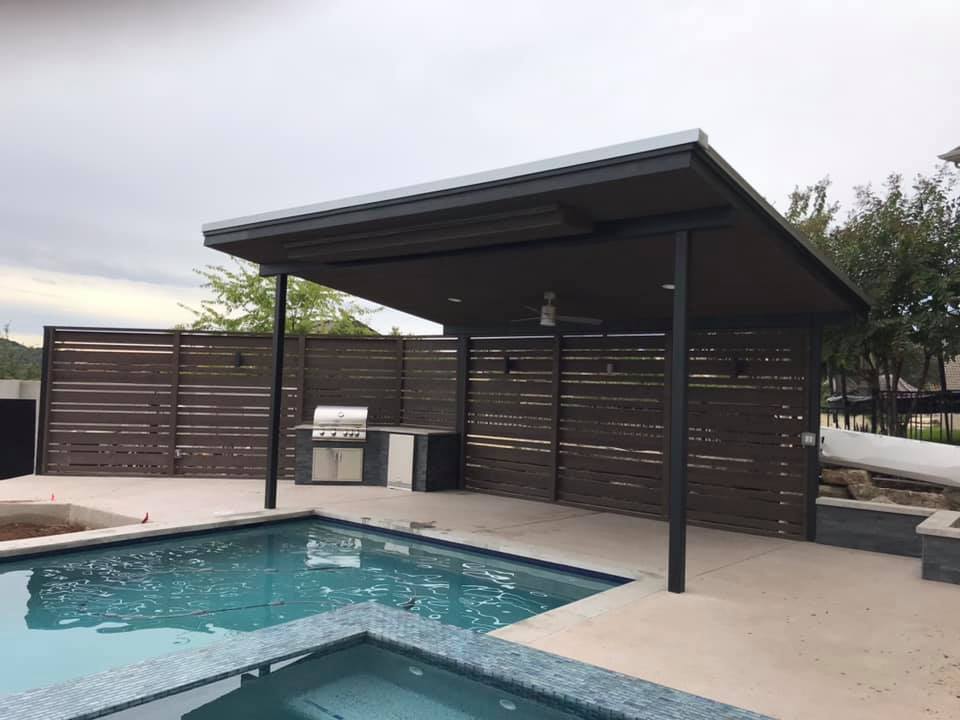 Wrapped up a cool patio cover with a rain sheer over the pool